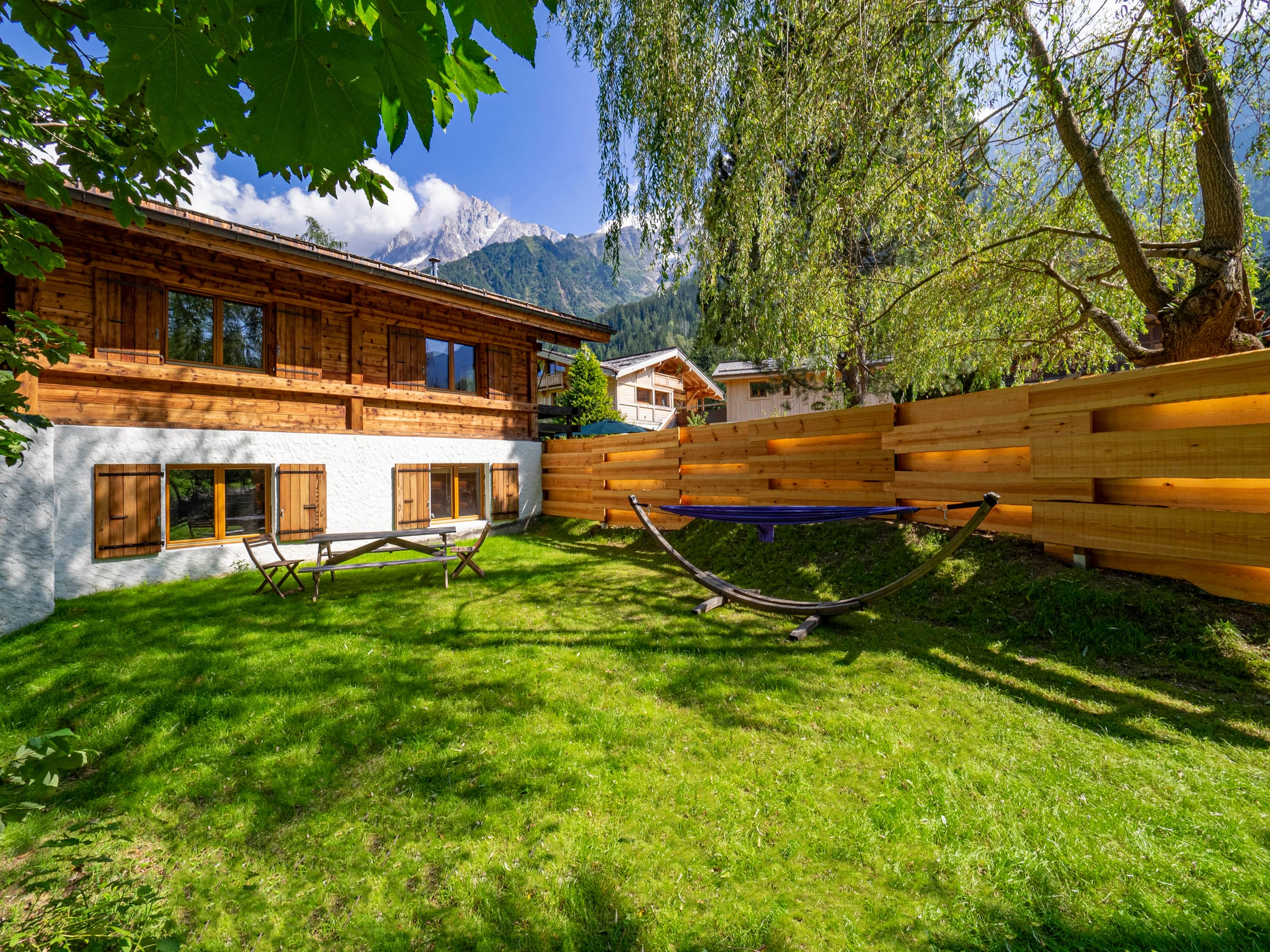Private lawned garden with mountain views